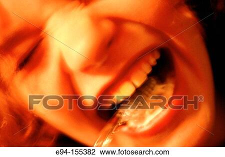 Close up of a young teenage girl brushing her teeth, eyes closed, slightly blurry View Large Photo Image Stock Image - Close up of a young teenage girl brushing her teeth, eyes closed, slightly blurry. Fotosearch