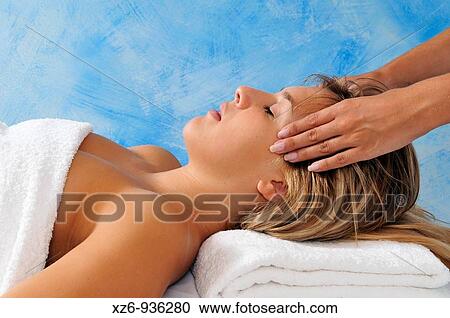 Close-up of a Young woman receiving face massage View Large Photo Image Stock Image - Close-up of a Young woman receiving face massage. Fotosearch