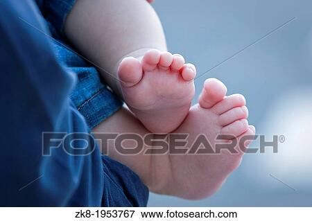 Stock Photo - close up of baby feet.. Fotosearch