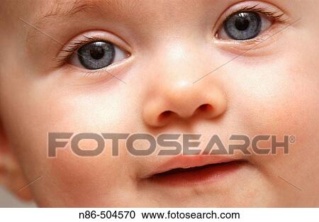 Close-up of baby smiling View Large Photo Image Stock Image - Close-up of baby smiling. Fotosearch
