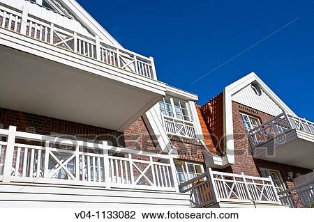 Close up of balconies on the island of Spiekeroog in Germany, Europe View Large Photo Image Stock Image - Close up of balconies on the island of Spiekeroog in Germany, Europe. Fotosearch