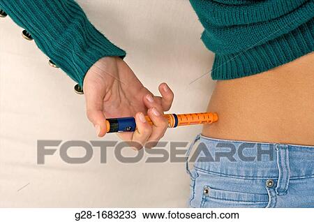 close up of beautiful teenage girl suffering from diabetes and injecting herself insulin in her hip View Large Photo Image Stock Image - close up of beautiful teenage girl suffering from diabetes and injecting herself insulin in her hip. Fotosearch