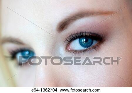 Close up of blue eyes of a 19 year old woman. View Large Photo Image Picture - Close up of blue eyes of a 19 year old woman.. Fotosearch