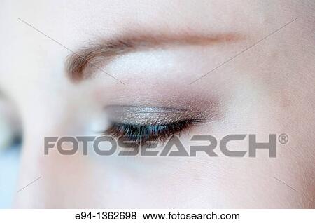 Close up of blue eyes of a 19 year old woman. View Large Photo Image Stock Photo - Close up of blue eyes of a 19 year old woman.. Fotosearch