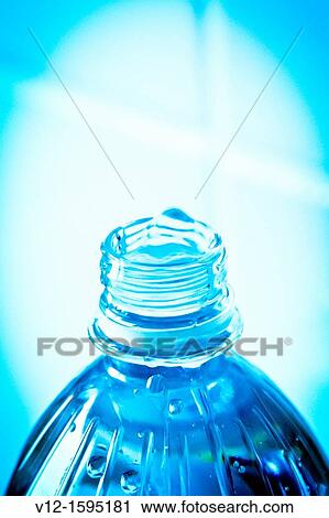 Stock Image - Close-up of bottle water. Fotosearch