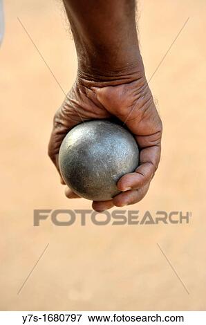Close-up of bowls ball in players hand in Puducherry Pondichery, Tamil Nadu, South India, Asia View Large Photo Image Stock Photo - Close-up of bowls ball in players hand in Puducherry Pondichery, Tamil Nadu, South India, Asia. Fotosearch