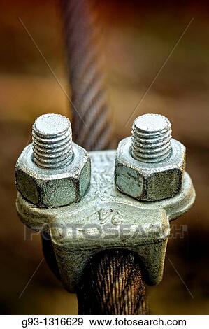 Close-up of cable clamp with selective focus View Large Photo Image Stock Photo - Close-up of cable clamp with selective focus. Fotosearch