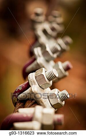 Close-up of cable clamps with selective focus View Large Photo Image Stock Image - Close-up of cable clamps with selective focus. Fotosearch