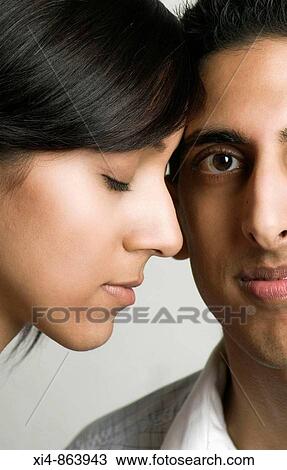 Close up of couple faces View Large Photo Image Stock Image - Close up of couple faces. Fotosearch