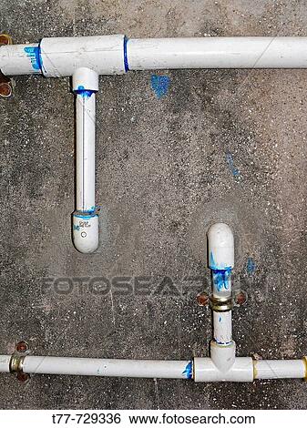 Stock Photograph - Close up of drinking water supplier pipes Ratnagiri, Maharashtra, India. Fotosearch