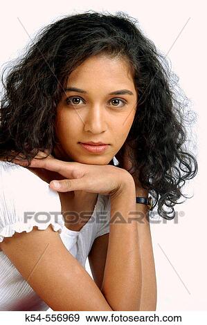 Close up of expressive young girl, having curly hairs. View Large Photo Image Stock Photo - Close up of expressive young girl, having curly hairs.. Fotosearch