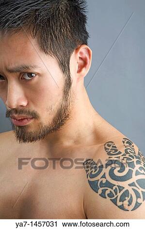 Close Up Of Face Of Chinese Man with Tattoo View Large Photo Image Stock Image - Close Up Of Face Of Chinese Man with Tattoo. Fotosearch
