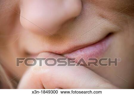 Stock Image - close up of female smile. Fotosearch