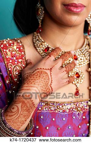 Stock Photo - Close up of hand mehndi. Fotosearch