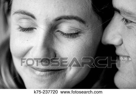 Close-up of happy couple View Large Photo Image Stock Image - Close-up of happy couple. Fotosearch