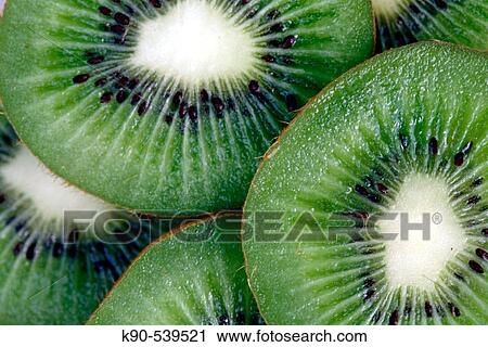 Close-up of Kiwi slices View Large Photo Image Stock Image - Close-up of Kiwi slices. Fotosearch