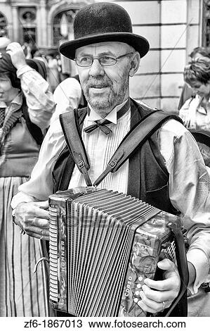 Close up of local people in traditional costume in dancing band in famous Old Town of tourist city of Prague in Czech Republic View Large Photo Image Stock Image - Close up of local people in traditional costume in dancing band in famous Old Town of tourist city of Prague in Czech Republic. Fotosearch