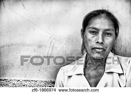 Close up of local woman with colorful wall in Copan Ruinas Honduras downtown city action View Large Photo Image Picture - Close up of local woman with colorful wall in Copan Ruinas Honduras downtown city action. Fotosearch