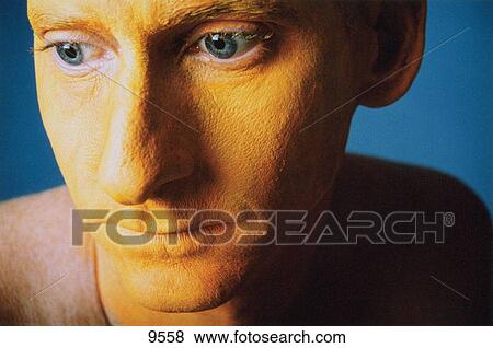 Close-up of male profile distorted with painted yellow skin View Large Photo Image Stock Photo - Close-up of male profile distorted with painted yellow skin. Fotosearch