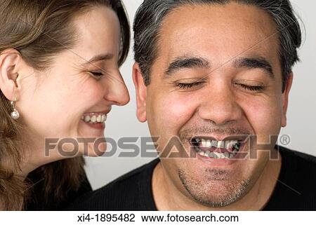 Close-up of mature couple laughing Wrinkles and stubble are visible View Large Photo Image Stock Image - Close-up of mature couple laughing Wrinkles and stubble are visible. Fotosearch