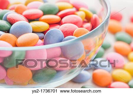 Stock Image - Close up of multicolored candy. Fotosearch