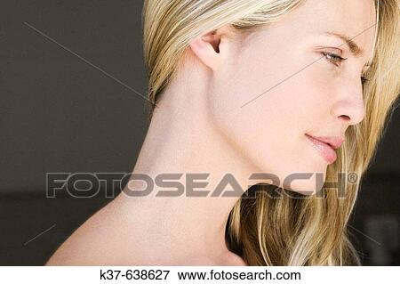 Close up of neck & profile of young woman with long blonde hair. View Large Photo Image Stock Photo - Close up of neck & profile of young woman with long blonde hair.. Fotosearch