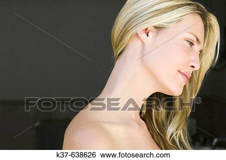 Close up of neck & profile of young woman with long blonde hair. View Large Photo Image Stock Photograph - Close up of neck & profile of young woman with long blonde hair.. Fotosearch