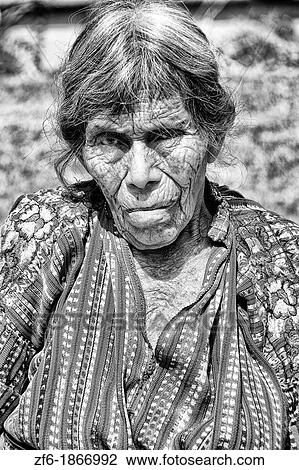 Close up of old lady and wrinkles with colorful print patterned clothes of women in the famous market day color of the Highlands in village of Solola Guatemala View Large Photo Image Stock Image - Close up of old lady and wrinkles with colorful print patterned clothes of women in the famous market day color of the Highlands in village of Solola Guatemala. Fotosearch