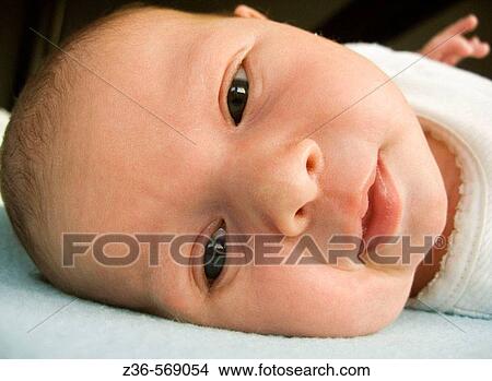Picture - Close-up of one week old girl. Fotosearch