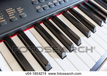 Picture - Close up of piano keys. Fotosearch