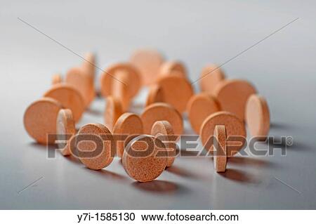 Stock Image - Close-up of pills arranged. Fotosearch