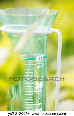 Close up of rain gauge in garden. View Large Photo Image Stock Image - Close up of rain gauge in garden.. Fotosearch