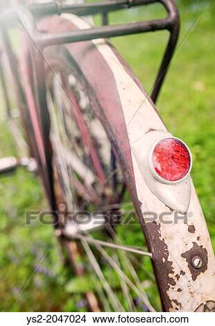 Close up of rear light on old retro bike. View Large Photo Image Picture - Close up of rear light on old retro bike.. Fotosearch