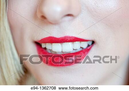 Close up of red lips and mouth of a young woman View Large Photo Image Stock Photo - Close up of red lips and mouth of a young woman. Fotosearch