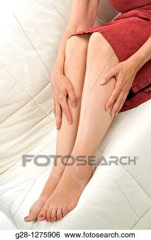 close up of senior woman aching legs View Large Photo Image Stock Photograph - close up of senior woman aching legs. Fotosearch