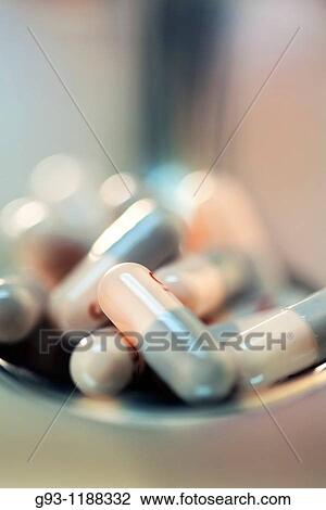 Stock Image - Close-up of spoon with drugs. Fotosearch