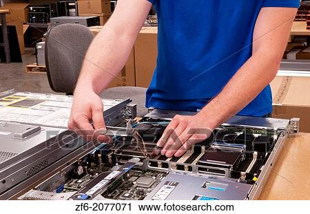 Close up of technician assembling server for computer IT company for shipment or repair. View Large Photo Image Stock Image - Close up of technician assembling server for computer IT company for shipment or repair.. Fotosearch