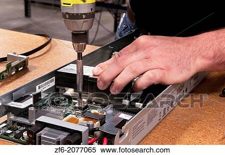 Close up of technician assembling server for computer IT company for shipment or repair. View Large Photo Image Stock Photography - Close up of technician assembling server for computer IT company for shipment or repair.. Fotosearch