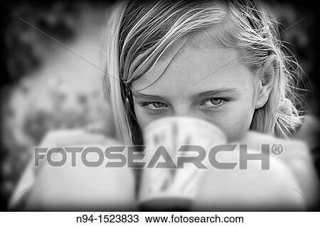 Close up of teenage girl with a cup of soup in the garden. View Large Photo Image Stock Image - Close up of teenage girl with a cup of soup in the garden.. Fotosearch