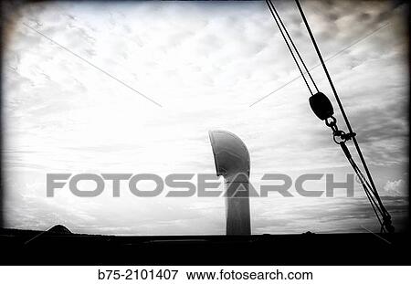 Close-up of the deck of a classic sailboat with a vent, and a pulley at the Port Mahon, Menorca, Balearic Islands, Spain. View Large Photo Image Stock Photo - Close-up of the deck of a classic sailboat with a vent, and a pulley at the Port Mahon, Menorca, Balearic Islands, Spain.. Fotosearch