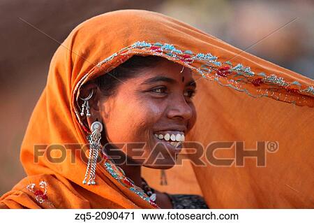 Close-up of tribal woman, Madhya Pradesh, India. Bhil tribe. View Large Photo Image Stock Image - Close-up of tribal woman, Madhya Pradesh, India. Bhil tribe.. Fotosearch
