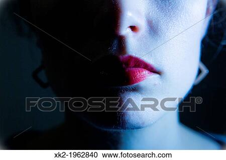 Close up of woman's chick, half side blue View Large Photo Image Stock Image - Close up of woman's chick, half side blue. Fotosearch