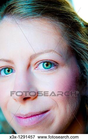 Close-up of young woman face View Large Photo Image Stock Photo - Close-up of young woman face. Fotosearch
