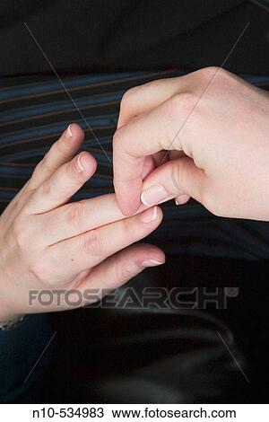 Close-up of young woman's hands View Large Photo Image Stock Image - Close-up of young woman's hands. Fotosearch