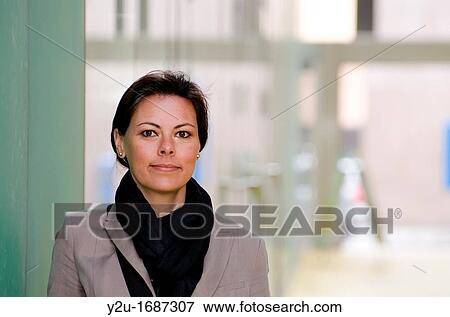 Close up on a self confident and happy woman View Large Photo Image Stock Photo - Close up on a self confident and happy woman. Fotosearch