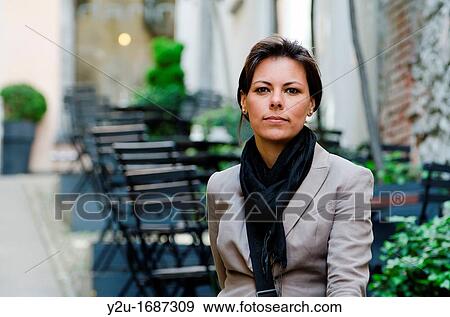 Close up on a self confident and happy woman View Large Photo Image Stock Photo - Close up on a self confident and happy woman. Fotosearch