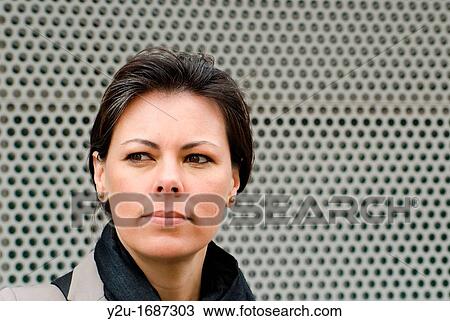 Stock Image - Close up on a self confident woman. Fotosearch