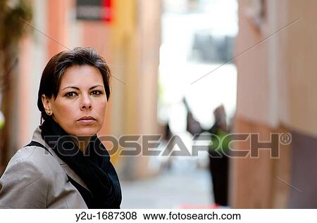 Close up on a self confident woman View Large Photo Image Stock Photo - Close up on a self confident woman. Fotosearch