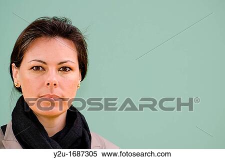 Close up on a self confident woman who watching View Large Photo Image Stock Photography - Close up on a self confident woman who watching. Fotosearch