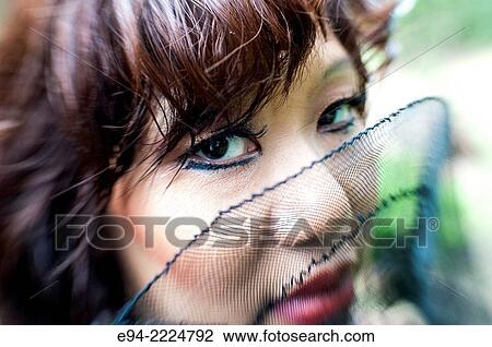 Close up portrait of a 38 year old Asian-American looking at the camera. View Large Photo Image Stock Image - Close up portrait of a 38 year old Asian-American looking at the camera.. Fotosearch